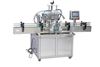 Picture of 4 heads Automatic liquid filling machine with conveyor PLC control by sea