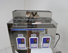 Picture of 3 Heads  Automatic Weigh filling and Back side sealing machine 300g